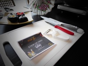 Foto van flyer met mes en plank